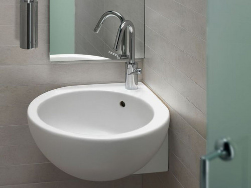 Раковина Hatria You and Me 46 L Y0H601 угловая Белая фаянс подвесная